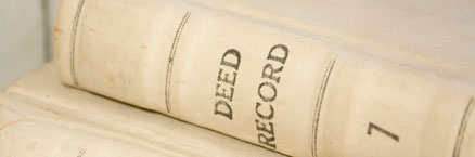 Photo of a deed book spine for the Continuing Genealogy Studies courses banner